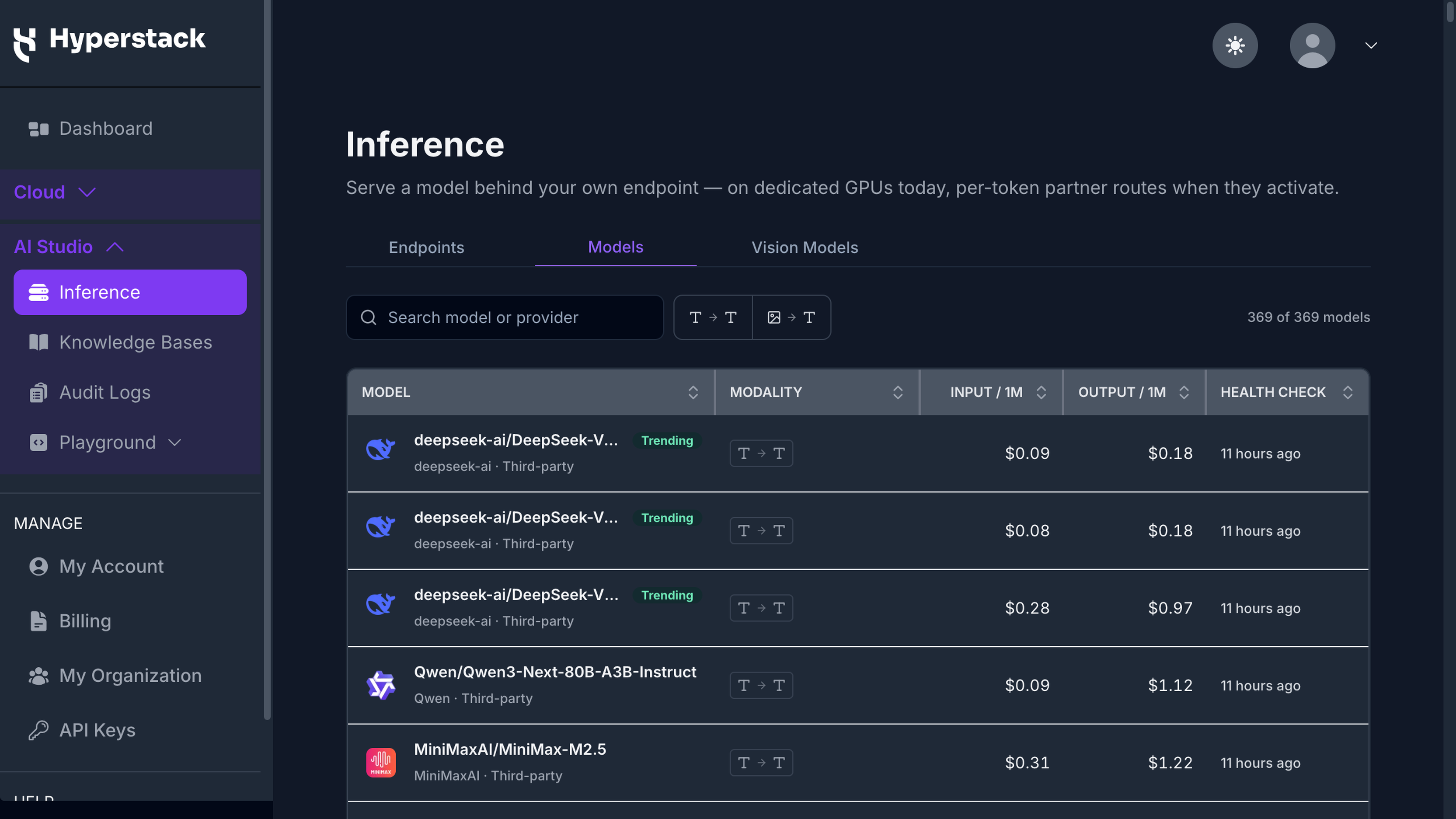 Inference page, Models tab, listing each model with its modality, input and output price per 1 million tokens, and last health check, with a Trending badge on the most-used models