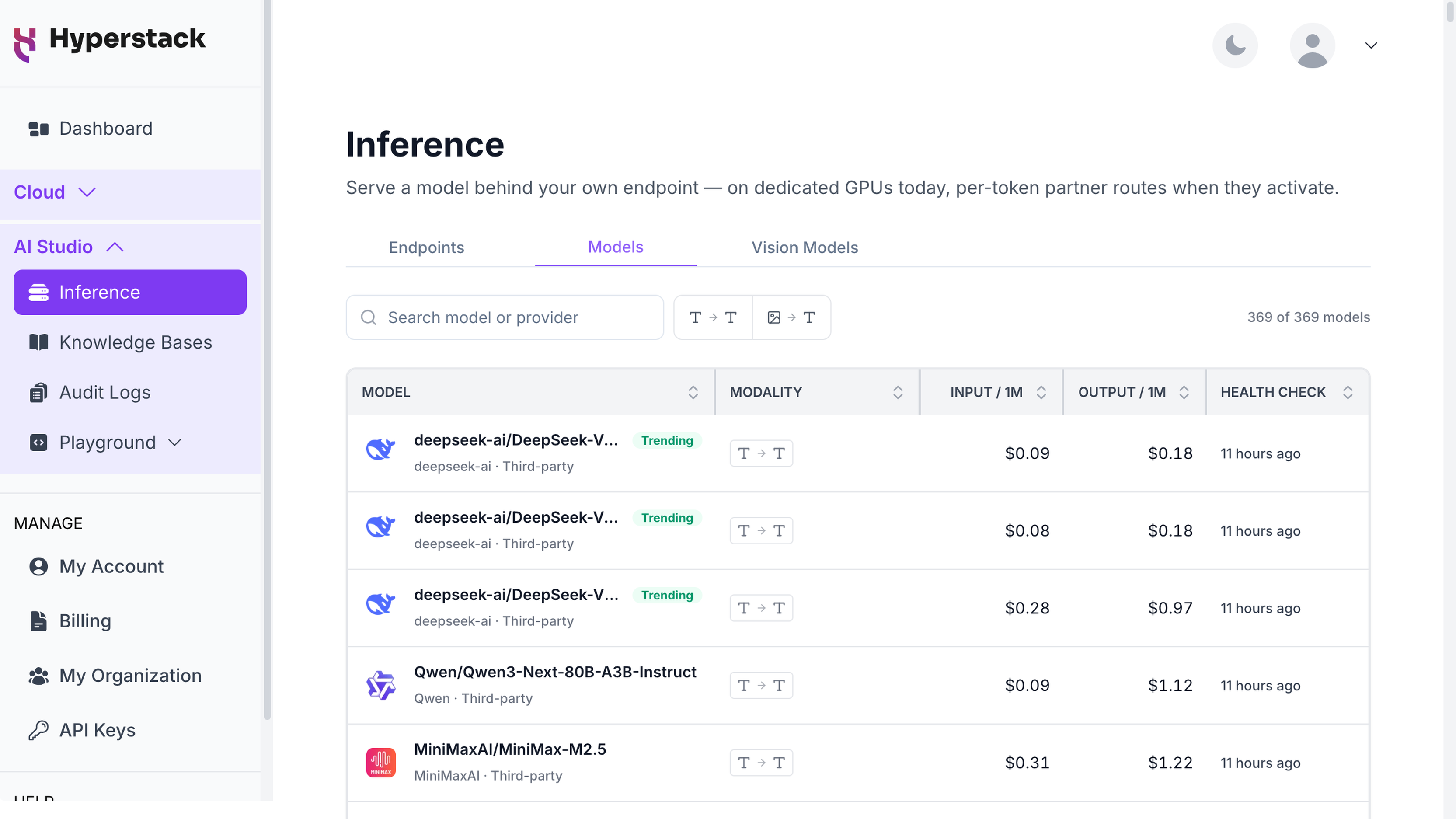 Inference page, Models tab, listing each model with its modality, input and output price per 1 million tokens, and last health check, with a Trending badge on the most-used models